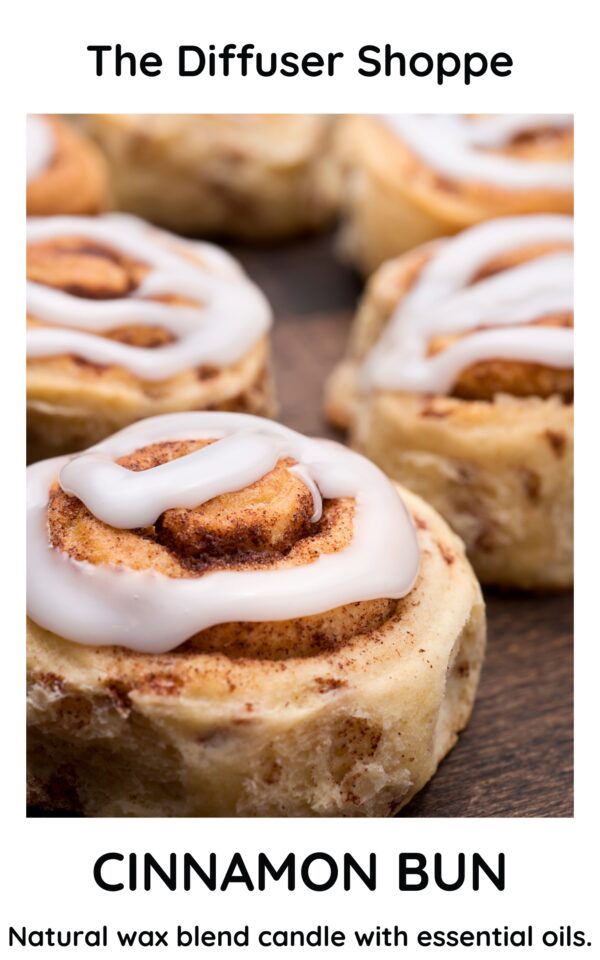 A close up of some cinnamon rolls with icing