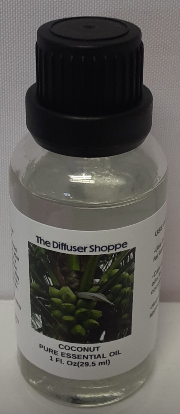 A bottle of oil with the label " the diffuser shoppe ".