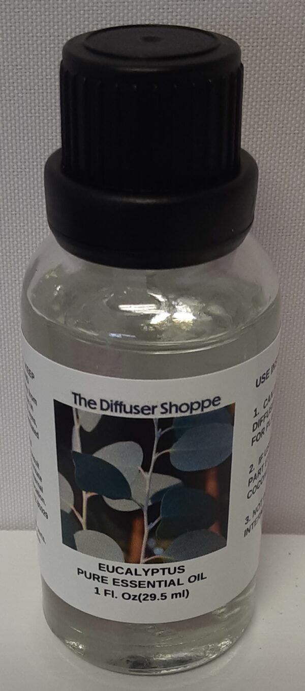 A bottle of water with the label " the diffuser shoppe ".