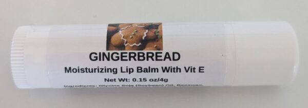 A tube of lip balm with the label for it.