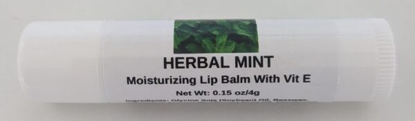 A tube of lip balm with leaves on it.