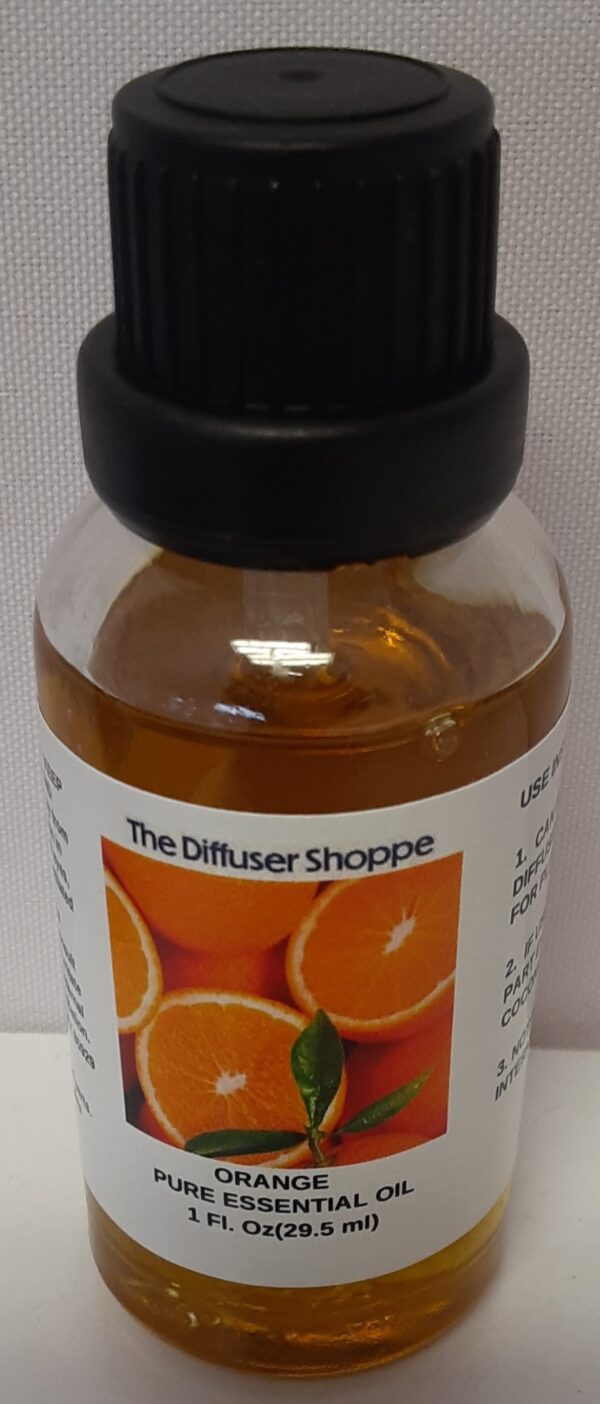 A bottle of orange oil with the label for the diffuser shoppe.