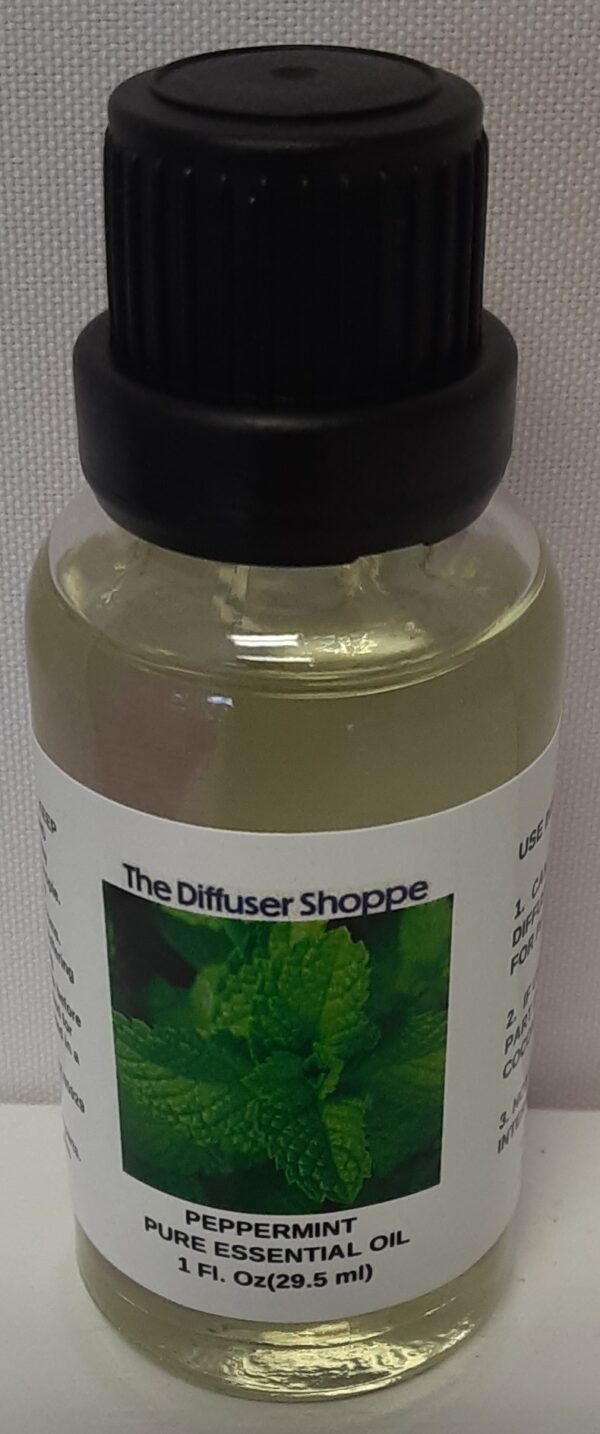 A bottle of essential oil with the label for the diffuser shoppe.