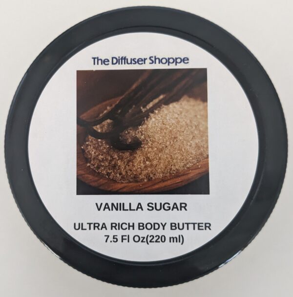 A jar of vanilla sugar body butter on top of a table.